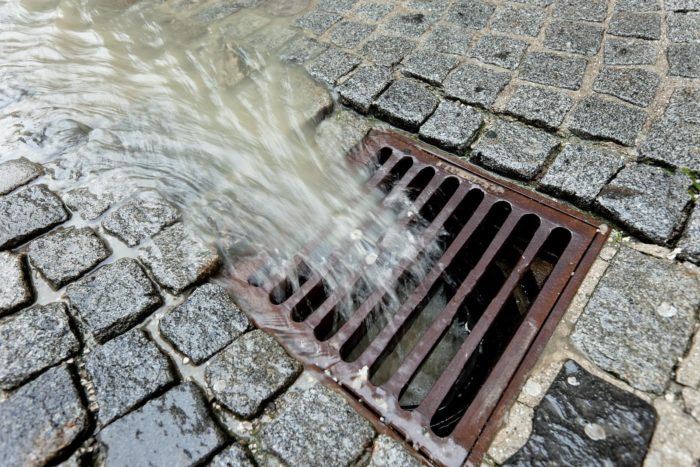 Water-going-into-sewer-700x467